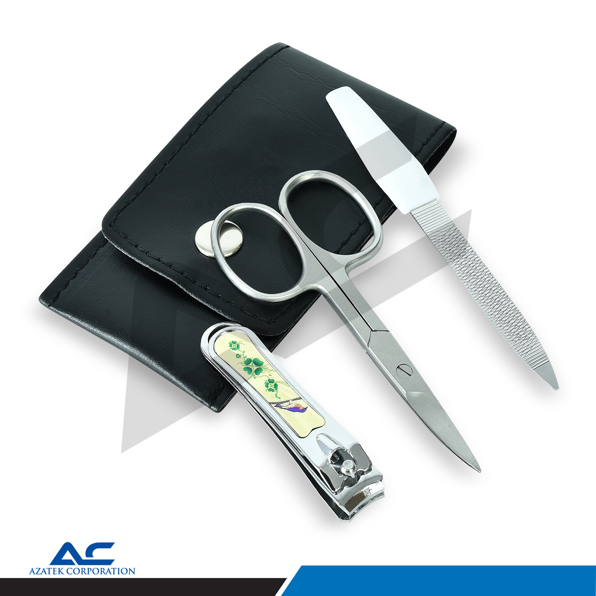 A manicure and grooming set including silver metal nail clippers with a decorative green and yellow handle, silver nail scissors, and a silver nail file, arranged on a black faux-leather pouch against a white background.